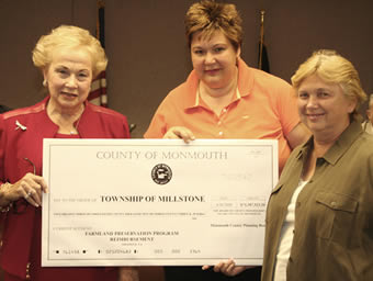 Freeholder Director Lillian Burry presents check for farmland preservation